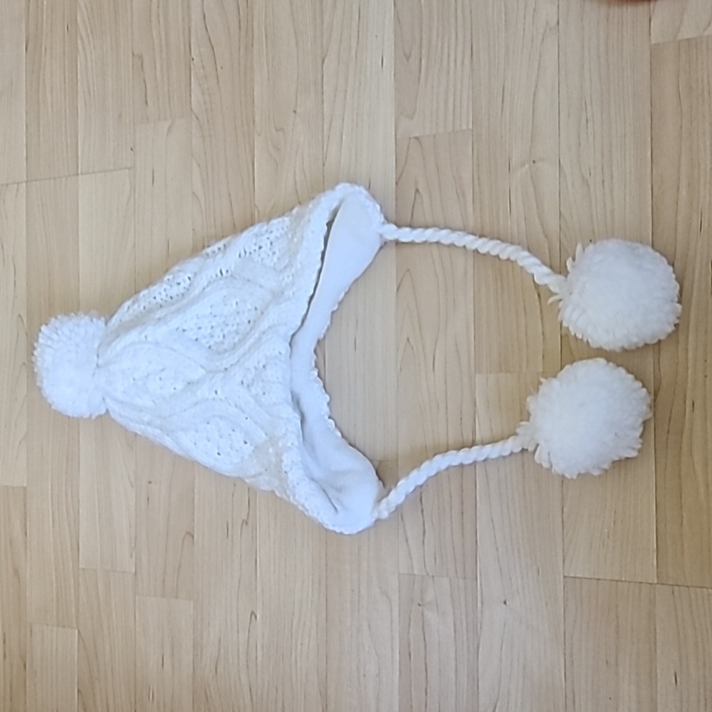 Girls white knit pom beanie with Fleece lining and pom tails